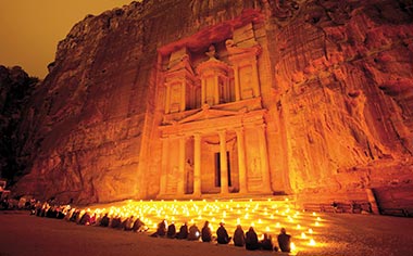 The Treasury in the ancient city of Petra, illuminated by candles at night, Jordan